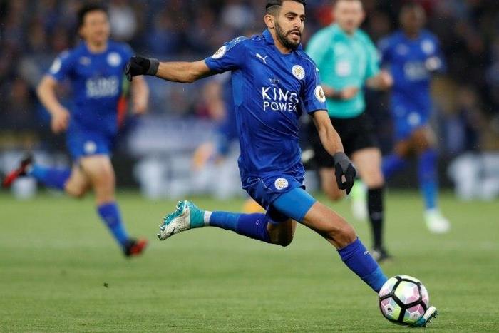 Leicester City's midfielder Riyad Mahrez runs with the ball during the English Premier League football match between Leicester City and Tottenham Hotspur at King Power Stadium in Leicester, central England on May 18, 2017