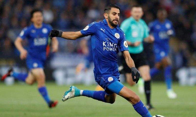 Leicester City's midfielder Riyad Mahrez runs with the ball during the English Premier League football match between Leicester City and Tottenham Hotspur at King Power Stadium in Leicester, central England on May 18, 2017