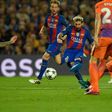 Barcelona's forward Lionel Messi (C) shoots to score a goal during the UEFA Champions League football match FC Barcelona vs Manchester City at the Camp Nou stadium in Barcelona on October 19, 2016