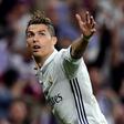 Real Madrid's Cristiano Ronaldo celebrates after scoring against Atletico Madrid during their Champions League match at the Santiago Bernabeu stadium on May 2, 2017