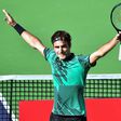 Roger Federer celebrates victory against compatriot Stan Wawrinka in the final of the Indian Wells Masters on March 19, 2017