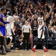 The Miami Heat players celebrate after winning their NBA game against the Golden State Warriors, at American Airlines Arena in Miami, Florida, on January 23, 2017