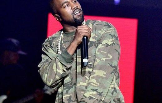 Kanye West performing during a concert