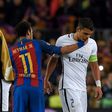 Barcelona's forward Neymar (C) greets Paris Saint-Germain's defender Thiago Silva (R) during the UEFA Champions League round of 16 second leg football match FC Barcelona vs Paris Saint-Germain FC at the Camp Nou stadium in Barcelona on March 8, 2017