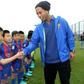 Brazilian player Ronaldinho meets children at the launch of a Barcelona football academy on the southern Chinese island of Hainan, on February 24, 2017