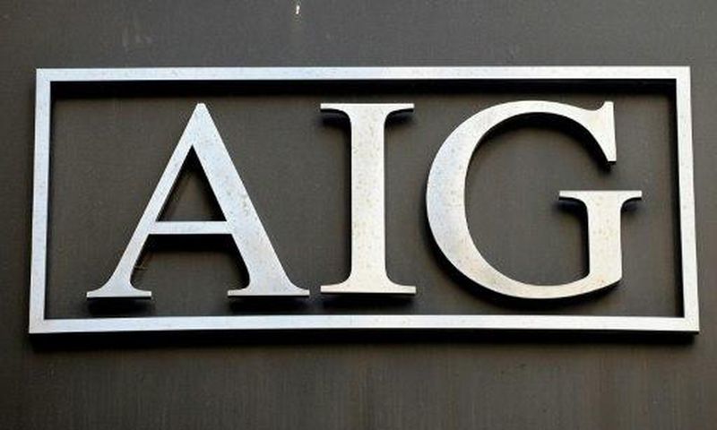 AIG reported a loss of $3.0 billion in the fourth quarter following a hefty charge to build reserves for future losses