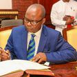 ___6495729___https:______static.pulse.com.gh___webservice___escenic___binary___6495729___2017___4___7___14___Dr.-Addison-signing-the-oath-book