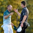 Justin Rose (R) congratulates Sergio Garcia after Garcia wins the 2017 Masters Tournament at Augusta National Golf Club