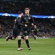 Celtic's Patrick Roberts (C) celebrates scoring a goal with teammate Stuart Armstrong during a UEFA Champions League match in Manchester, on December 6, 2016