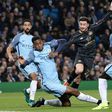 Patrick Roberts shoots past Manchester City's Oluwatosin Adarabioyo to score for Celtic at the Etihad Stadium in Manchester on December 6, 2016