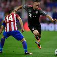 Bayern Munich forward Franck Ribery skips past Atletico Madrid midfielder Gabi during the Champions League group match at the Vicente Calderon Stadium in Madrid on September 28, 2016