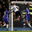 Tottenham Hotspur's midfielder Dele Alli (2nd L) jumps to score his and Totenham's second goal with this header during the English Premier League football match between Tottenham Hotspur and Chelsea at White Hart Lane in London, on January 4, 2017