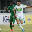 Algeria's midfielder Nabil Bentaleb (R) challenges Nigeria's midfielder Victor Moses during the 2018 FIFA World Cup African zone group B qualifying football match between Nigeria and Algeria at the Akwa Ibom State Stadium in Uyo on November 12, 2016