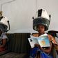 Women sitting under hair steamers read books from a mini-library at a hairdresser's in Abidjan.
