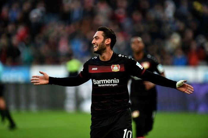 Leverkusen's midfielder Hakan Calhanoglu receives a four month ban after beng found guilt for breaking his contract with Trabzonspor when he left for Karlsruher in 2013