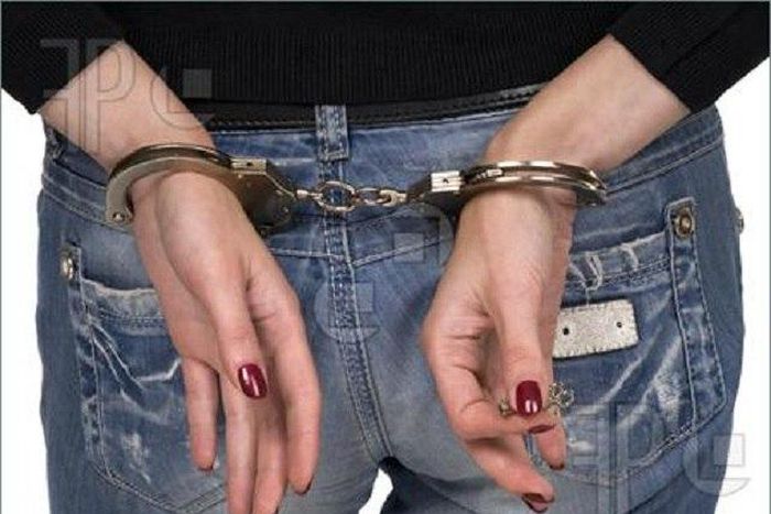 Woman in handcuffs