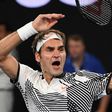 Switzerland's Roger Federer celebrates victory against Japan's Kei Nishikori in the fourth round of the Australian Open in Melbourne on January 22, 2017