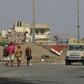 Yemeni pro-government forces are seen at the eastern entrance of Hodeida city on December 29, 2018