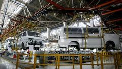 Cars are assembled in a workshop of an automobile factory in Shenyang, northeast China's Liaoning province