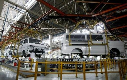 Cars are assembled in a workshop of an automobile factory in Shenyang, northeast China's Liaoning province