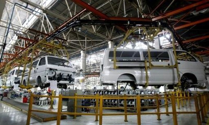 Cars are assembled in a workshop of an automobile factory in Shenyang, northeast China's Liaoning province
