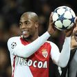Manchester City manager Pep Guardiola (R) pictured with Monaco's French defender Djibril Sidibe during the Champions League Round of 16 first-leg at the Etihad Stadium in Manchester, north west England on February 21, 2017