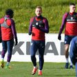 England's Interim manager Gareth Southgate (2R) watches England's striker Harry Kane (2L), England's defender Michael Keane (C), and England's midfielder Andros Townsend (R) during a team training session at St George's Park in Burton-on-Trent