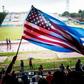 Fans wave Cuban and US flags on June 2, 2015, during the friendly game in Havana between the New York Cosmos and Cuba