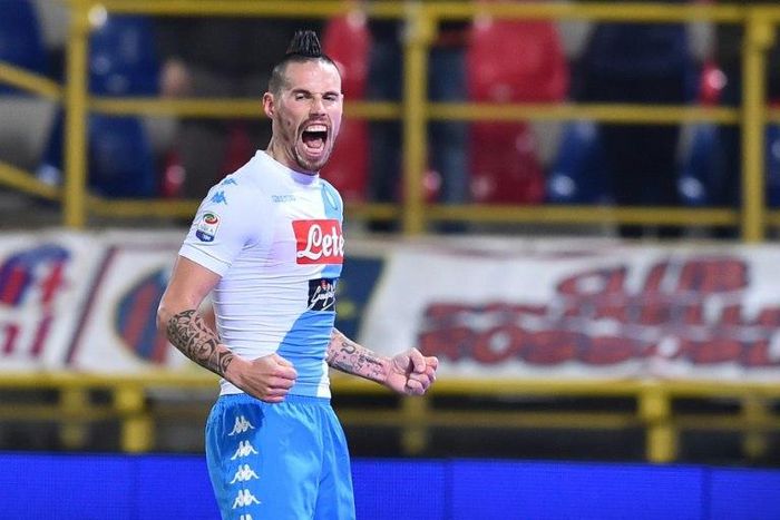 Napoli's Marek Hamsik celebrates after scoring against Bologna during their Serie A match on February 4, 2017