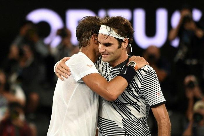 Rafael Nadal (left) congratulates Roger Federer after Federer won their men's singles final at the Australian Open in Melbourne on January 29, 2017