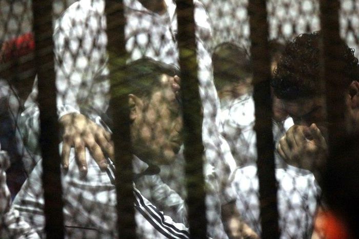 Defendants at their trial on riot charges in Cairo in 2015