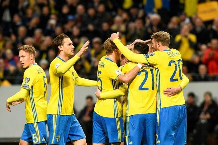 Sweden's midfielder Emil Forsberg celebrates with his teammates after scoring during their FIFA World Cup 2018 qualifier against Belarus in Solna on March 25, 2017