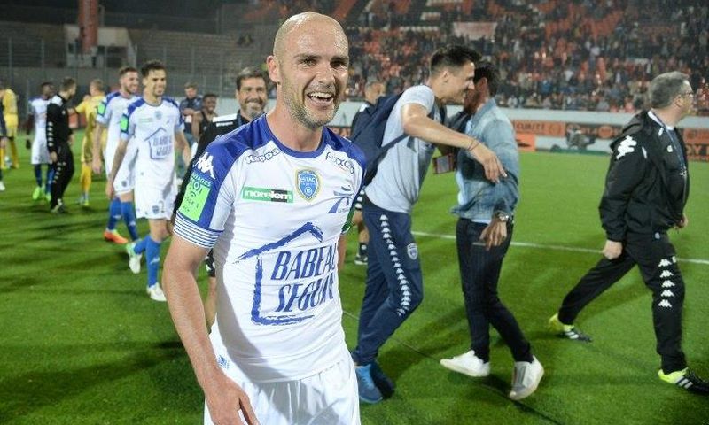 Troyes' midfielder Benjamin Nivet celebrates at the end of the play-off match against Lorient on May 28, 2017