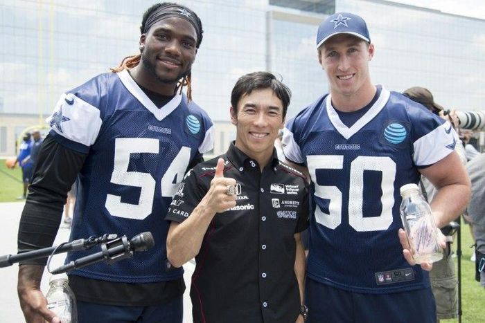 Indianapolis 500 Champion Takuma Sato (C) stands with Jaylon Smith and Sean Lee of the Dallas Cowboys in Frisco, Texas