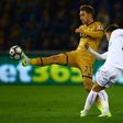 Tottenham Hotspur's midfielder Christian Eriksen (L) vies with Swansea City's English midfielder Tom Carroll during the English Premier League football match between Swansea City and Tottenham Hotspur at The Liberty Stadium on April 5, 2017