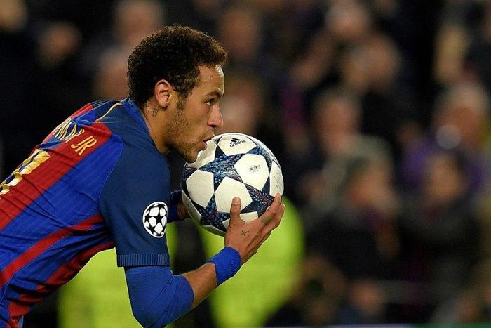 Barcelona's Neymar celebrates after scoring against Paris Saint-Germain during their last 16th UEFA Champions League match in Barcelona on March 8, 2017