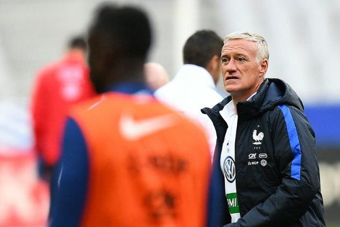 France's head coach Didier Deschamps speaks during a training session at the Stade de France stadium on October 6, 2016