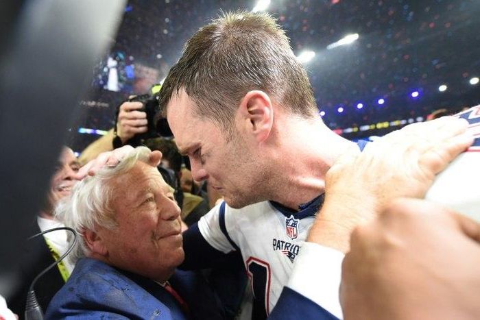 New England Patriots owner Robert Kraft (L) and Tom Brady of the New England Patriots celebrate winning Super Bowl 51 on February 5, 2017