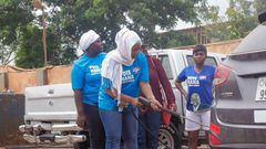 Dr. Bawumia's wife, Samira Bawumia joined other NPP loyal ladies to distribute party stickers