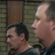 Willem Oosthuizen (right) and Theo Martins Jackson face charges of kidnapping and assaulting a colleague as they appeared at the Middleburg Magistrate Court on November 16, 2016