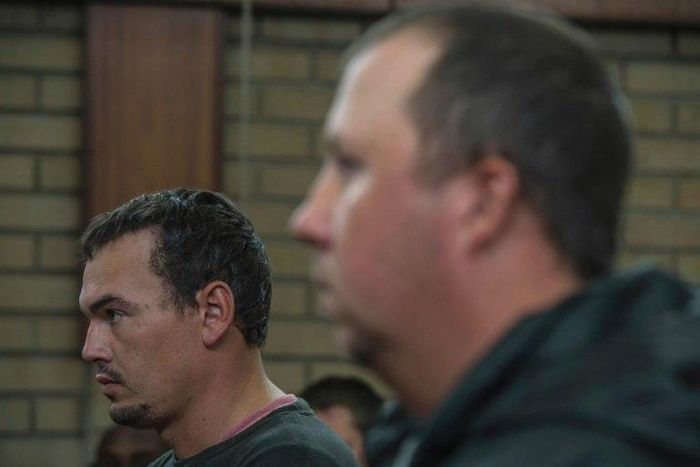 Willem Oosthuizen (right) and Theo Martins Jackson face charges of kidnapping and assaulting a colleague as they appeared at the Middleburg Magistrate Court on November 16, 2016
