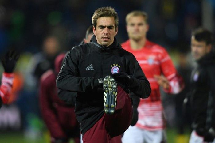 Bayern Munich defender Philipp Lahm warms up prior to the UEFA Champions League match against FC Rostov at Rostov-on-Don's Olimp 2 stadium in Rostov-on-Don, Russia on November 23, 2016