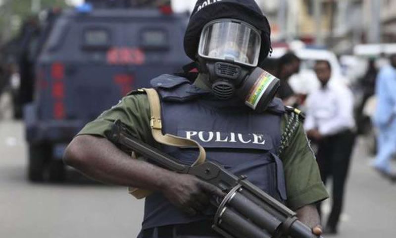 Masked Nigerian Police officer