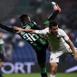 Roma's Alessandro Florenzi (R) vies with Sassuolo's Claude Adjapong on October 26, 2016