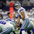 Dak Prescott of the Dallas Cowboys prepares to take the snap as the Cowboys play the Detroit Lions during the first half, at AT&T Stadium in Arlington, Texas, on December 26, 2016