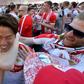 VfB Stuttgart's forward Takuma Asano (C) is celebrated by fans after the German second division team was promoted to the Bundesliga on May 21, 2017