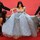 Bollywood actress Aishwarya Rai Bachchan needed a team of five to help her up the stairs at Cannes