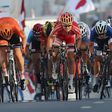Denmark's Amalie Dideriksen (C) sprints to win the women's elite road race event as part of the 2016 UCI Road World Championships on October 15, 2016, in the Qatari capital Doha