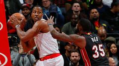 Dwight Howard of the Atlanta Hawks grabs a rebound against Willie Reed of the Miami Heat at Philips Arena on December 7, 2016