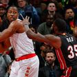 Dwight Howard of the Atlanta Hawks grabs a rebound against Willie Reed of the Miami Heat at Philips Arena on December 7, 2016